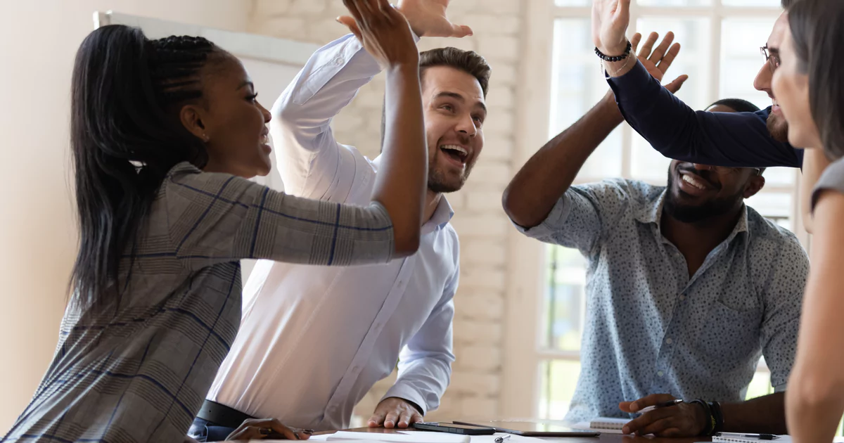 employees-high-fiving employees high fiving